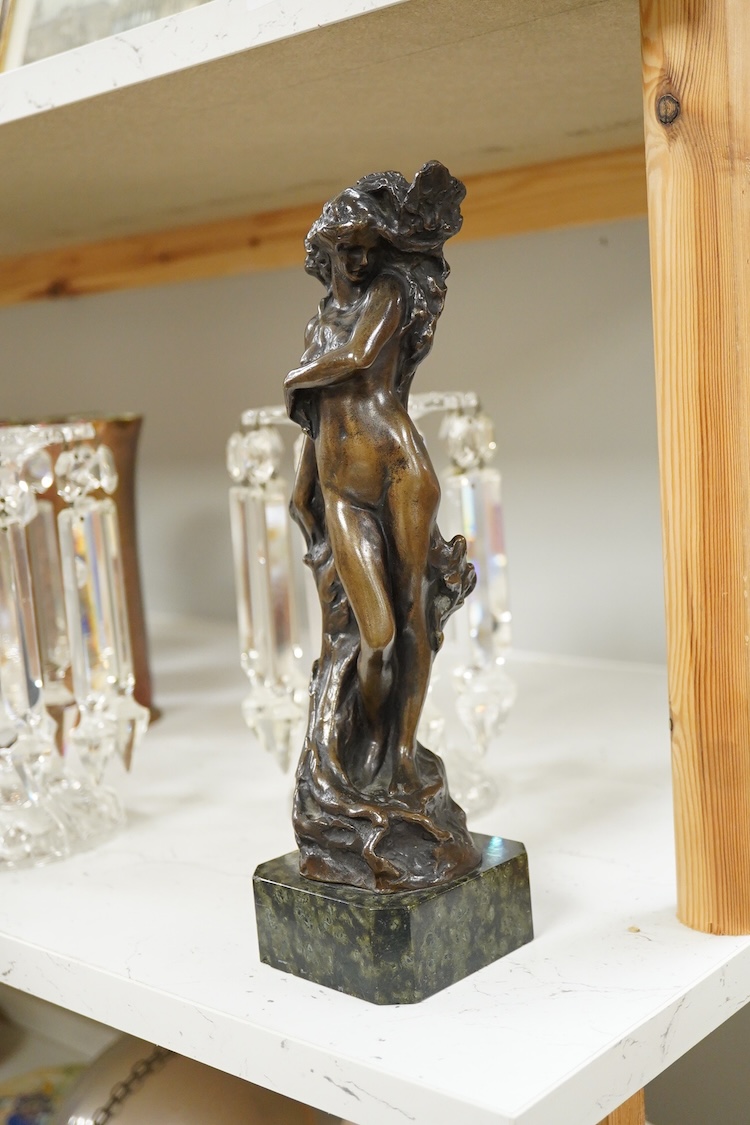 A bronze figurine of a nude female, raised on marble base, unsigned, 29cm high